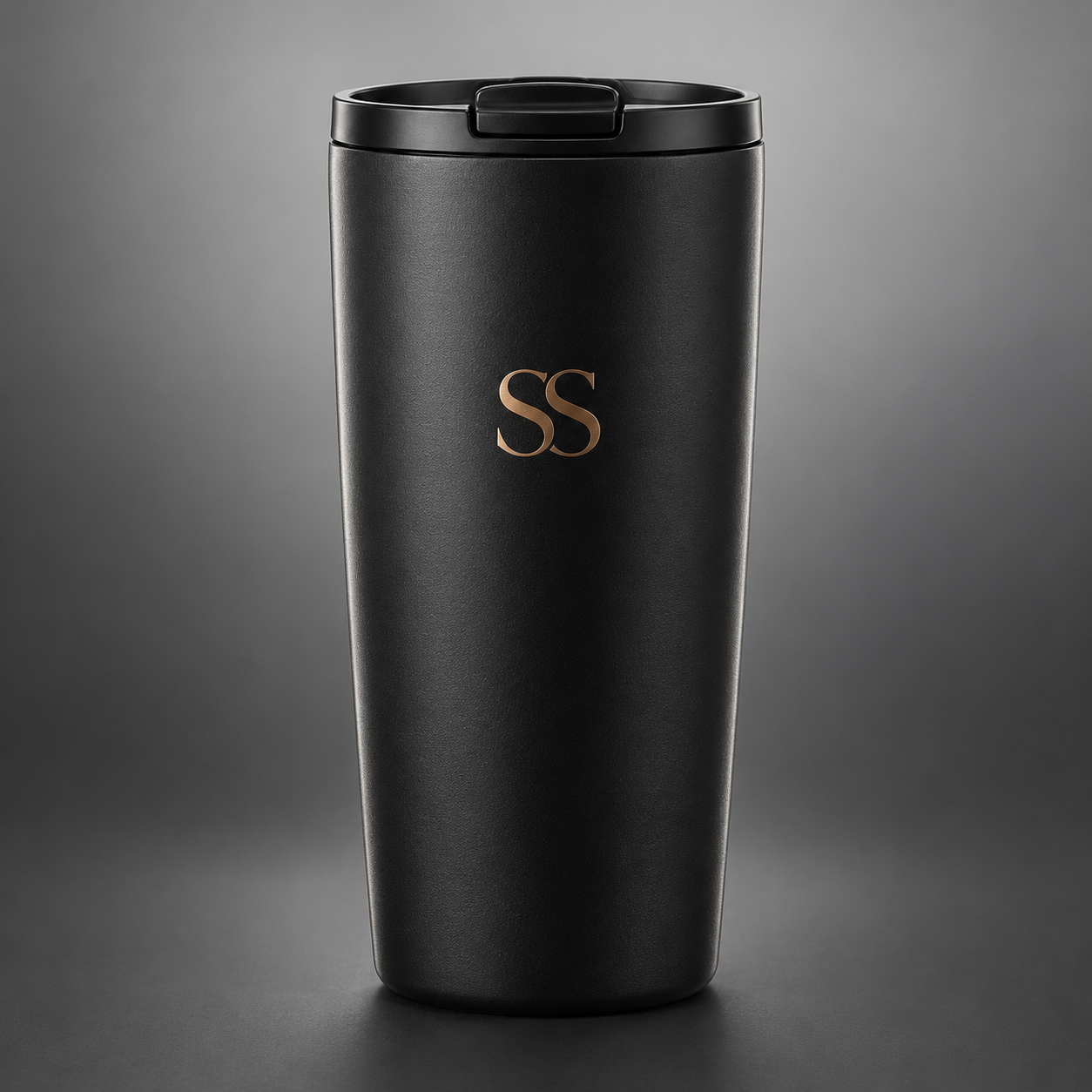 Black insulated tumbler with a bronze SS monogram.